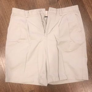 Khaki colored pleated shorts
